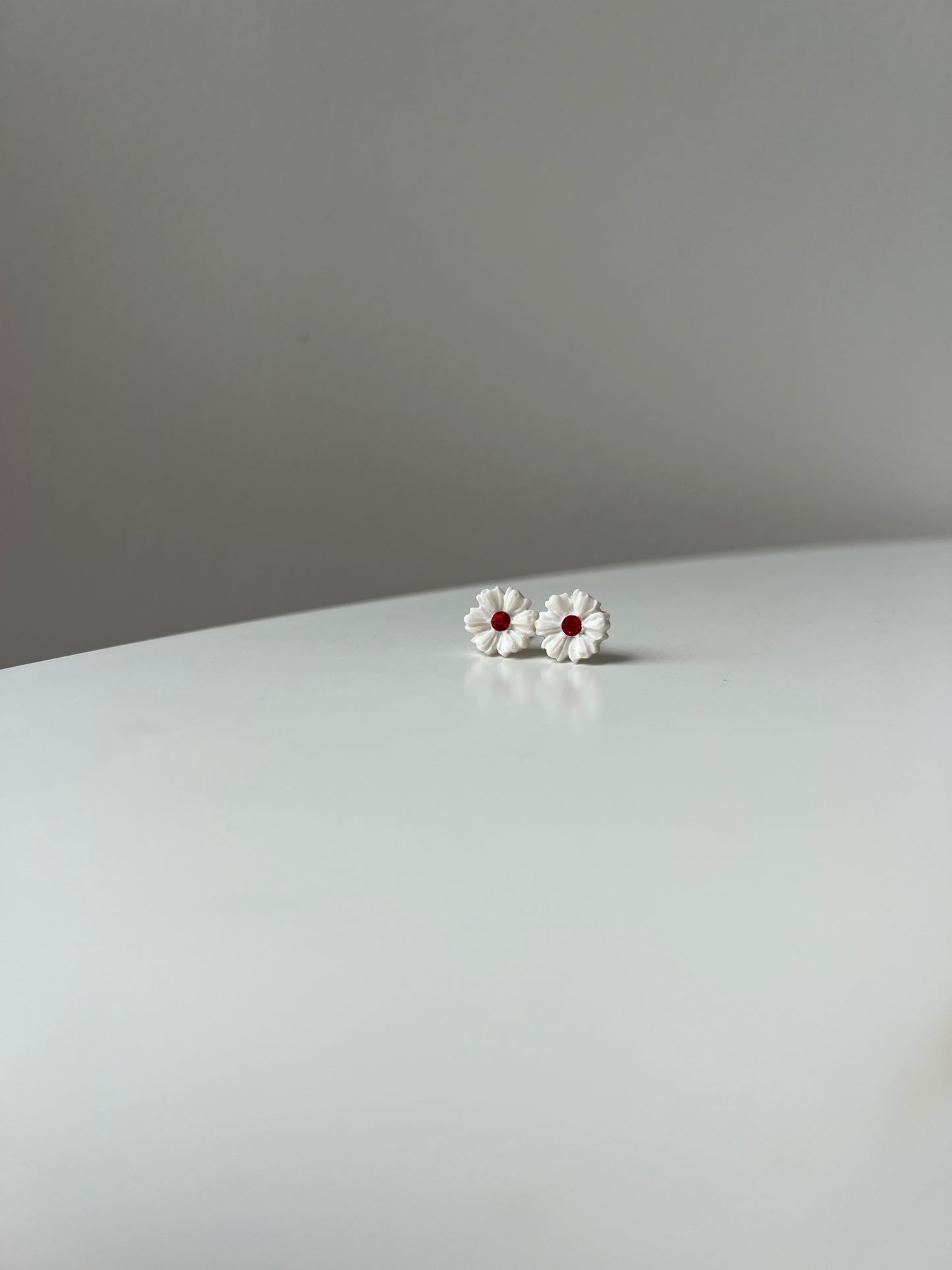 Daisies with a Red Gem